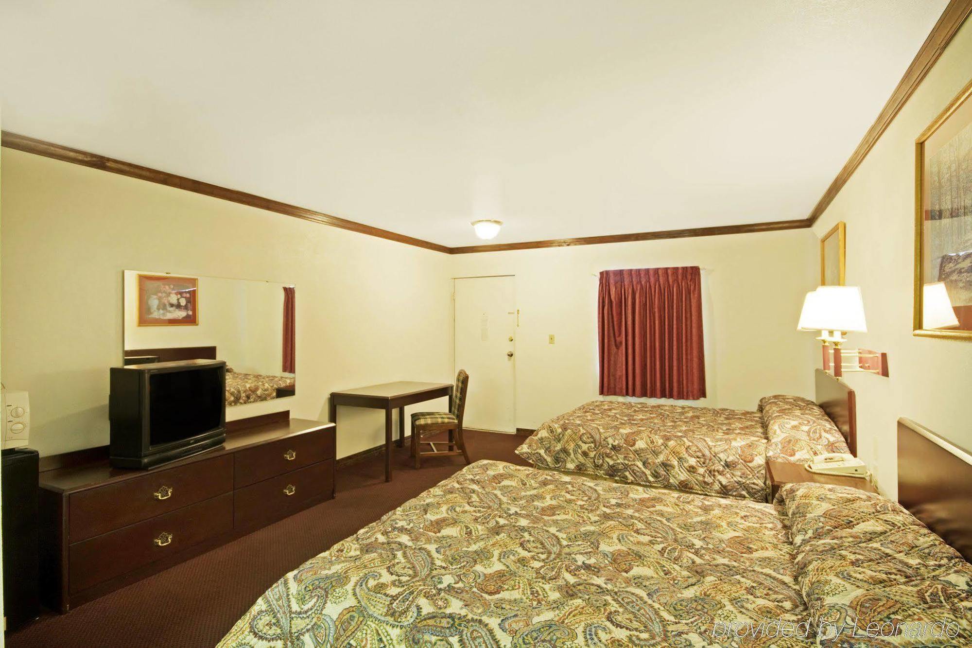 Executive Inn Muldrow Rom bilde